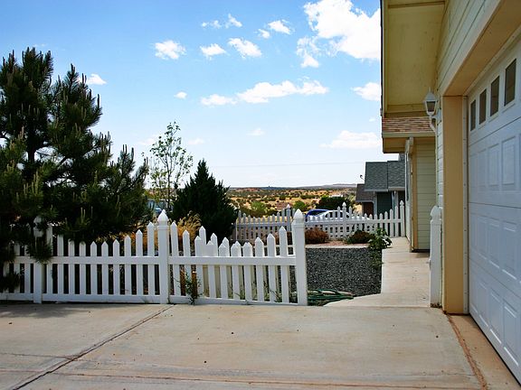 Fenced/Landscape Front Entry