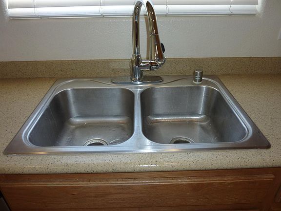 Sink with new kitchen faucet