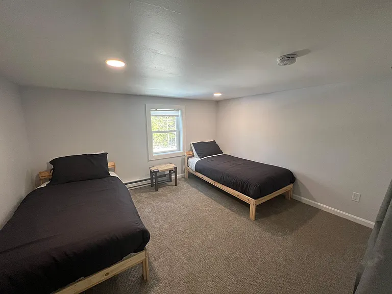 This twin bedroom can easily be converted to an office upon request.