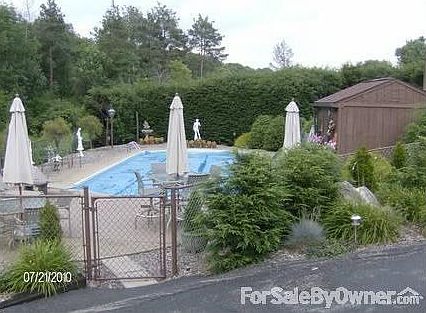 Pool Area and Pool House
						:
						Pool 18 X 42 ft. roman ends 12x12 pool house, high efficiency natural gas heater