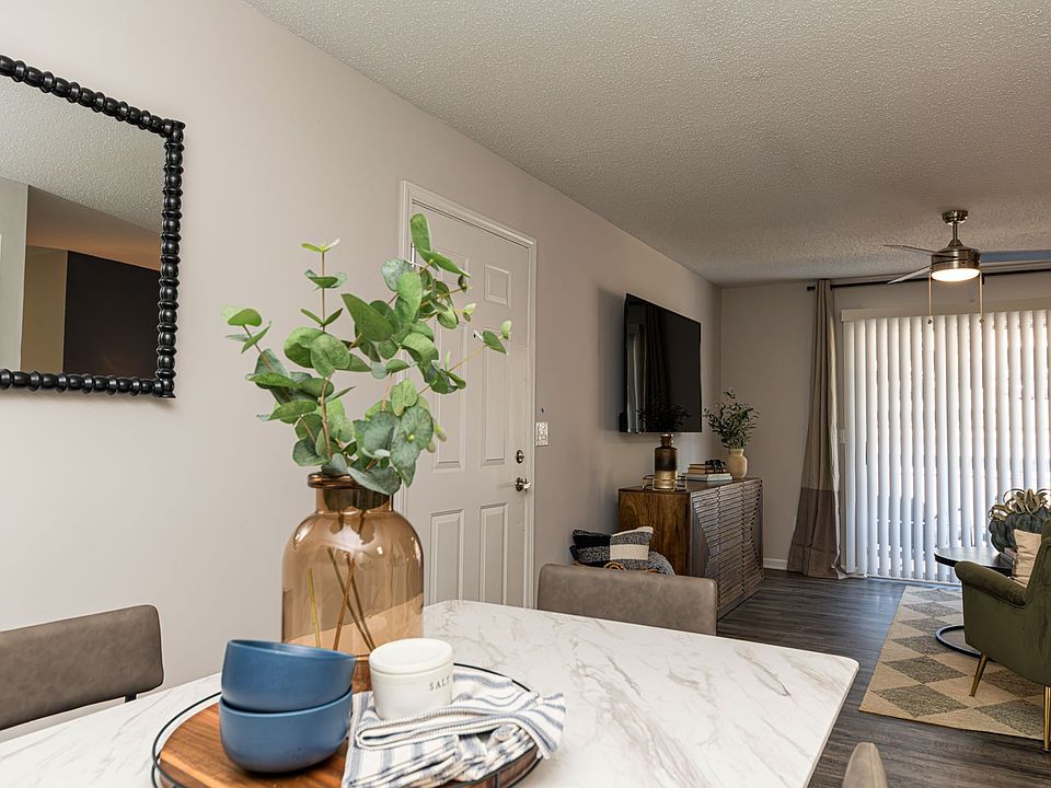 Dining area & living room with hardwood style flooring
