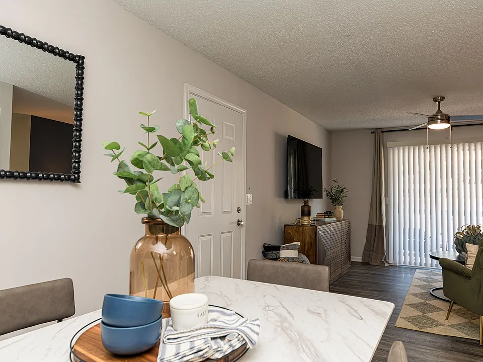 Dining area & living room with hardwood style flooring