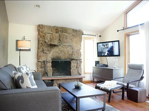 Living Room - warm and cozy with a working fireplace and all wood floors.