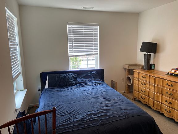 Bedroom for rent with windows facing West and South. 12x10