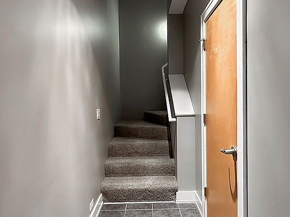 Entry Hallway, Door on the Right is to Half Bath Area