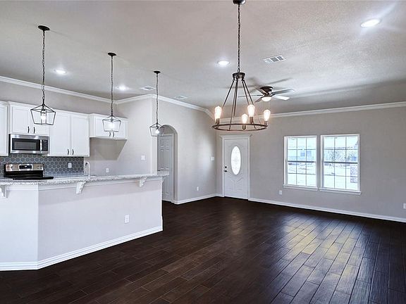 KITCHEN OPEN TO FAMILY ROOM