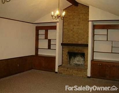 Living Room
						:
						Cathedral Ceilings and wood burning fireplace.