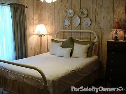Guest Bedroom
						:
						Features hardwood floors, picture window with pasture views & walk-in closet