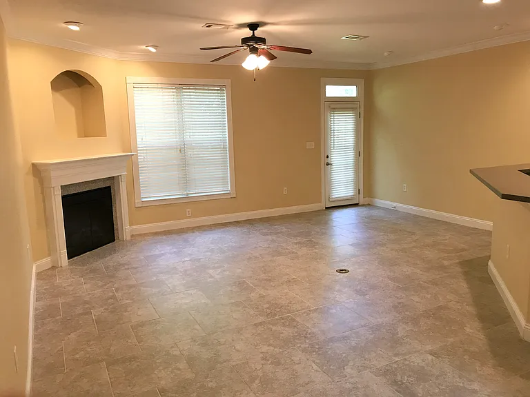This is the living/dining room area. The fireplace is electric and bar stools fit next to counter if desired.