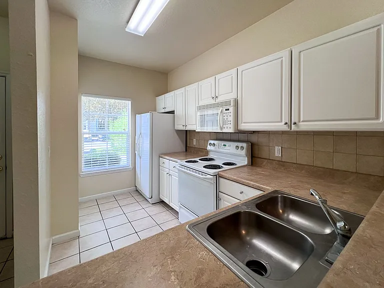 4886 NW 46th Pl #106 — Photo 2