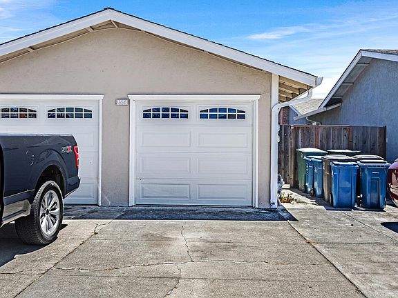 Attached 1 car garage and driveway parking spot (right Side)