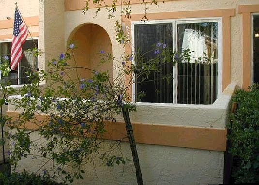 Front entry with private patio.