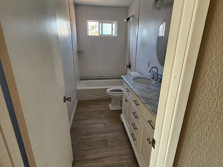 guest bath with view of new window installed open
