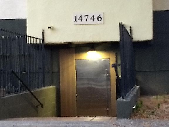 Pedestrian doorway must have code to get in under security surveillance