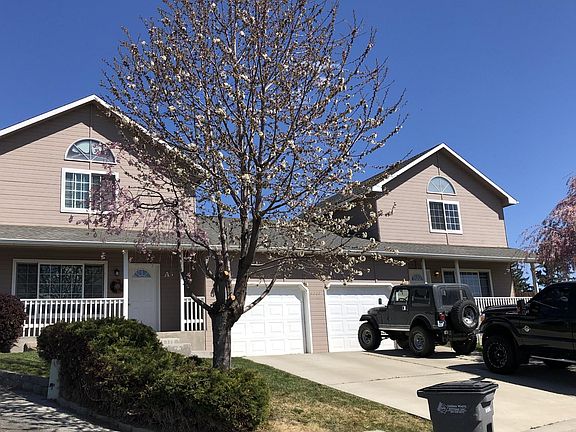 Duplex with separate garage and driveway