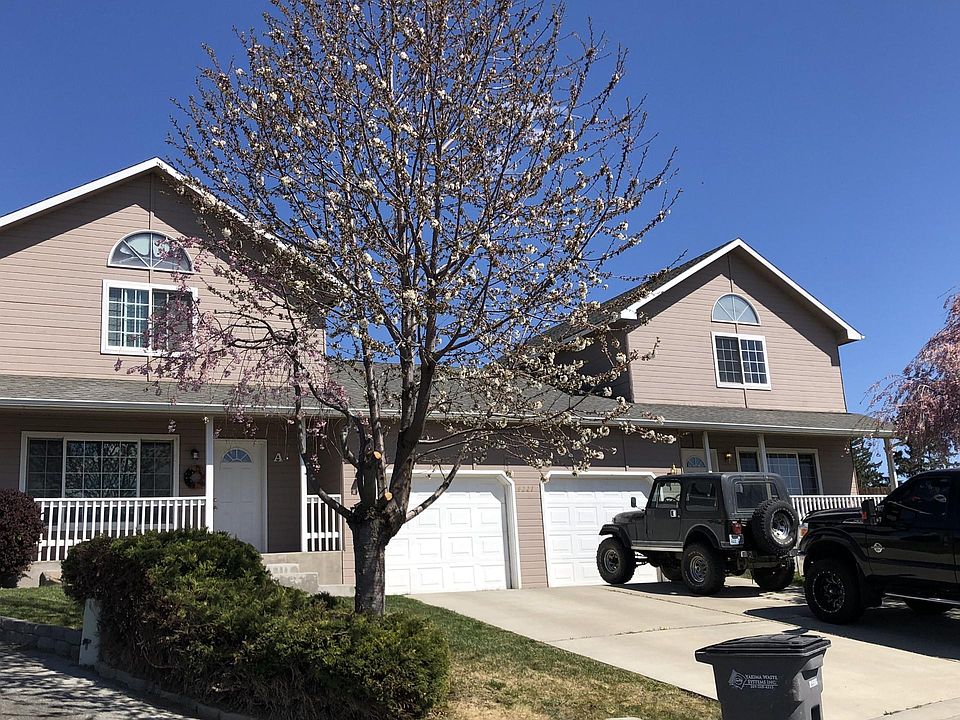 Duplex with separate garage and driveway