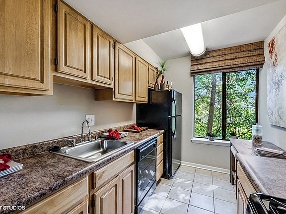 Updated Kitchen With Black Appliances