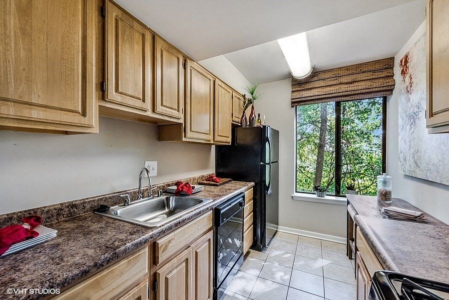 Updated Kitchen With Black Appliances