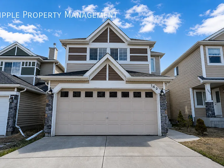 149 Cougar Plateau Way SW — Photo 35