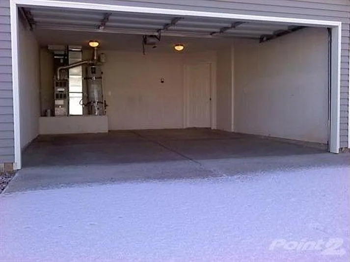 2-car garage with door to house
