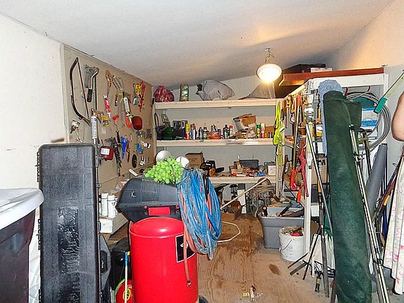 Storage room attached to shop..