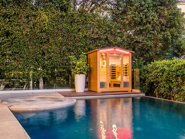 Outdoor sauna for 2 near the hot tub and pool to add to your health and wellness regime.