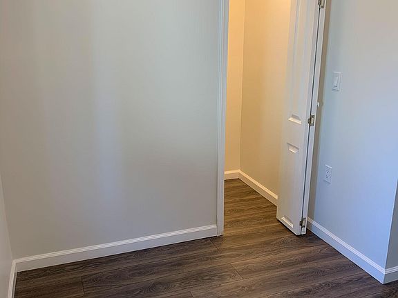 Bedroom and closet with storage