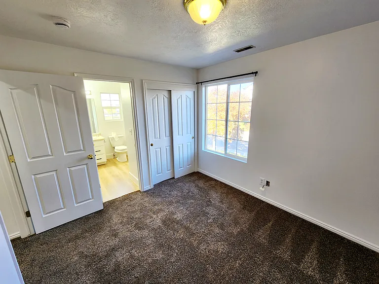 This is the second room that connects to a Jack & Jill full bathroom.