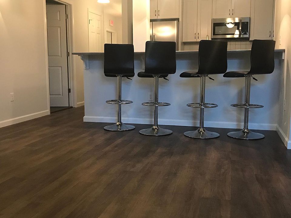 Living room facing kitchen counter.