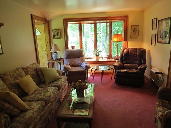 Living Room with large window which allows an abundance of light in.