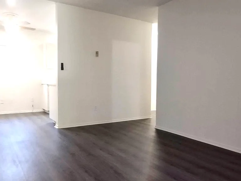 Living room, facing northeast, dining light on.