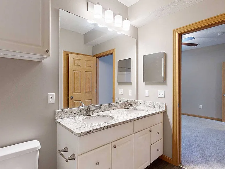 Our bathrooms include spacious vanities with ample storage, perfect for keeping your essentials organized.