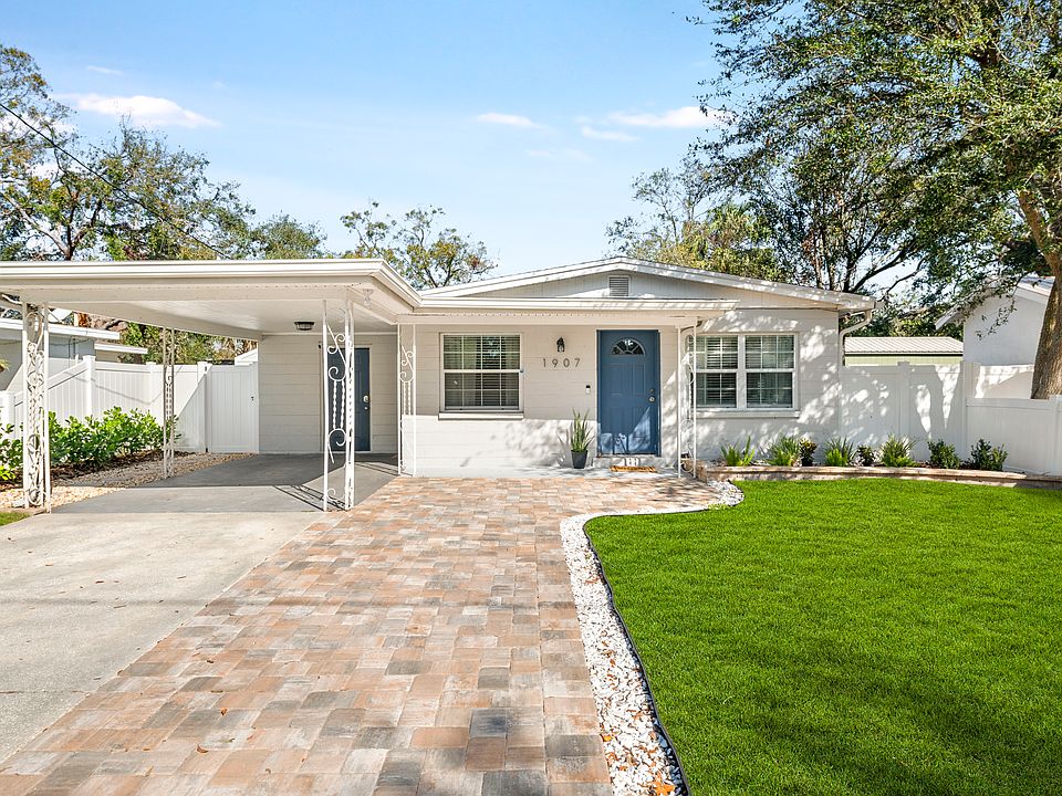 Beautiful home with 3-car private driveway/carport