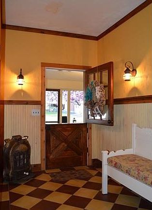 Charming front wood Dutch door brings you into the renovated Foyer!