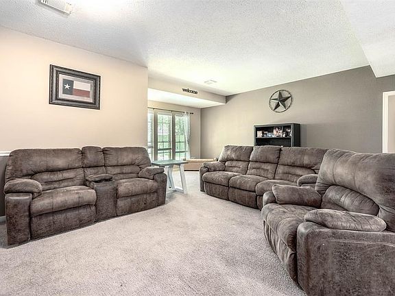 This light and bright spacious living room is the perfect layout for entertaining or just relaxing!