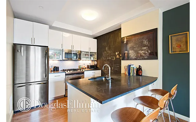 Sold by Douglas Elliman | media 13