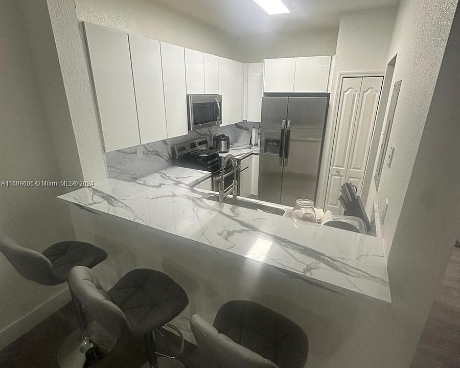 1st image of 7080 NW 177th St APT 103-13