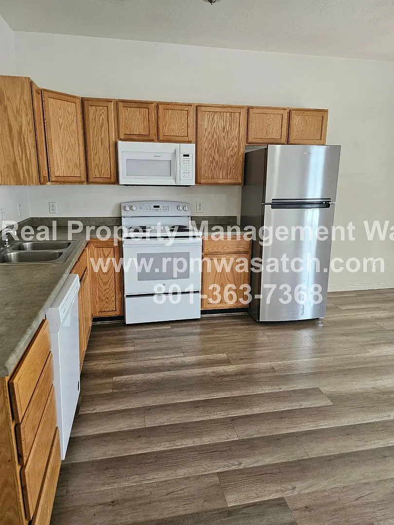 Come See This 3 Bedroom 2.5 Bathroom Town Home in West Valley City — Photo 4