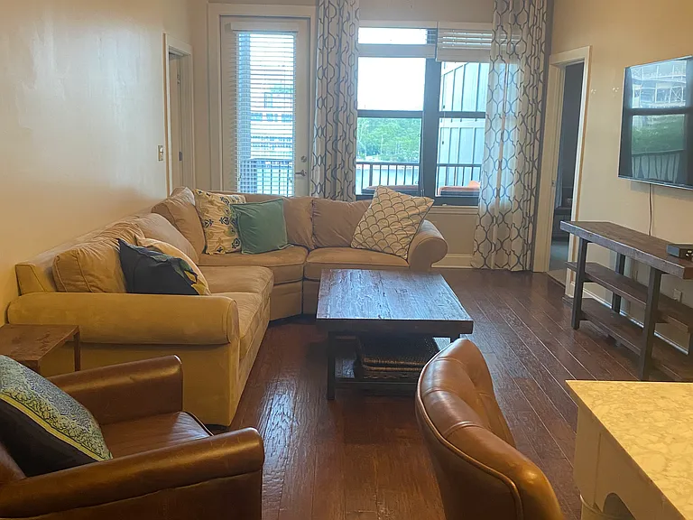 open concept of living room/kitchen during the daytime