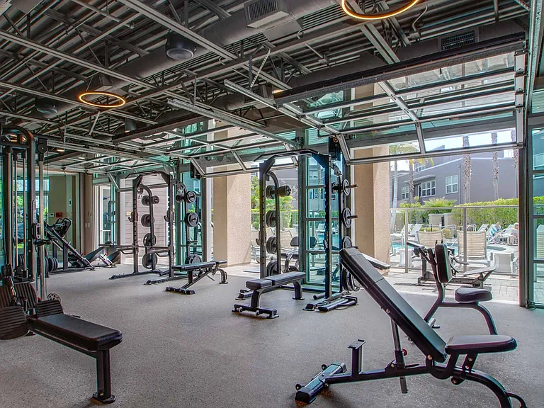 Work out indoors with resistance and cardio machines or lift weights in the outdoor workout space