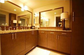 Double vanity in master with slab granite and heated floors