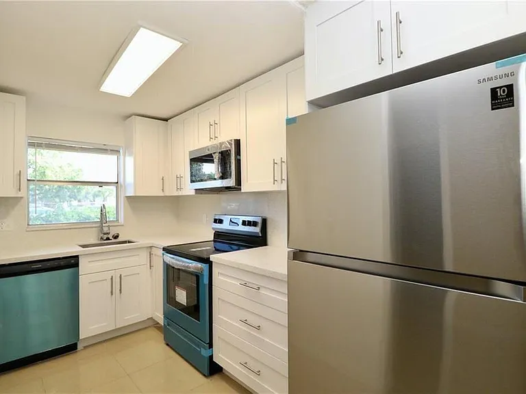 9915 Sandalfoot Blvd #408 — Photo 4