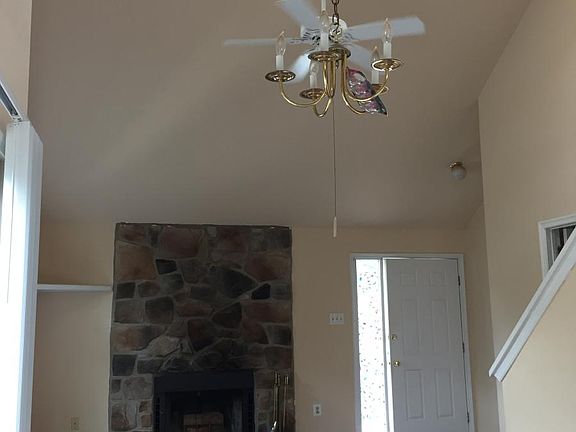 To Living Room from Kitchen showing Fireplace