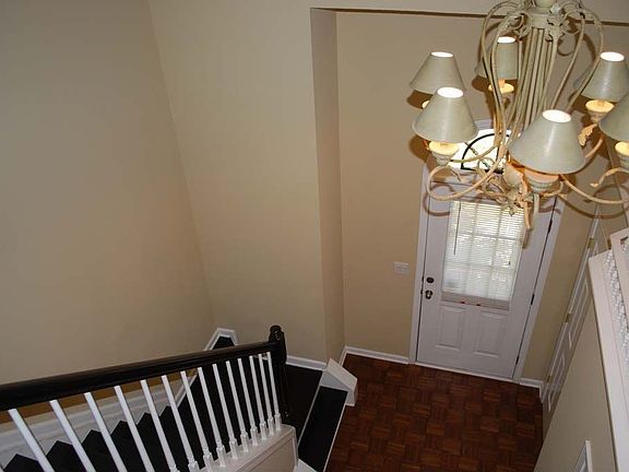 Inviting 2 Story Foyer with Hardwood Floor in the Foyer and Stairs