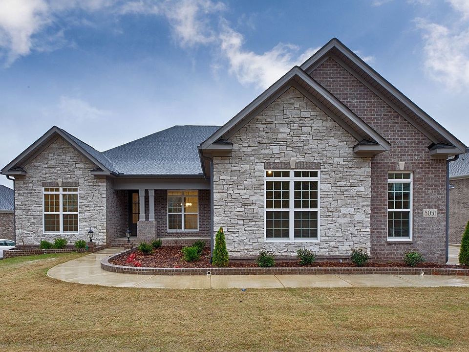 The Brookwood Basement is a gorgeous brick and stone home with beautiful mountain views