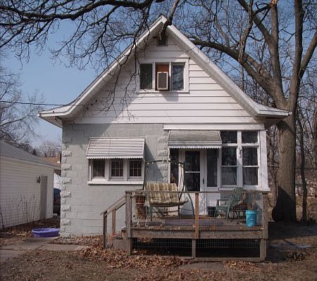 Front featuring deck and grand view.