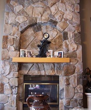 Enjoy the Stone fireplace as you cozy up in the Living Room.
