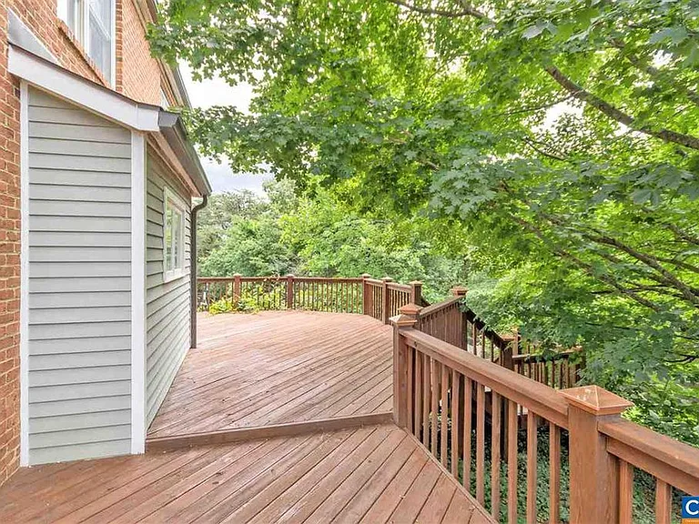 The entertainment deck is the central living location for most of the year. It is accessible from the kitchen and also the playroom. It gets nice shade from an old maple. The deck was redecked and stained this summer. There's a gate so your dogs can join!