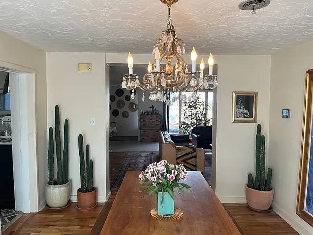 Main house dining room looking into living room