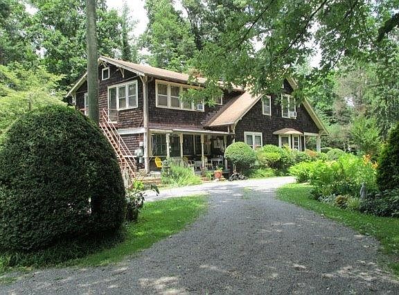 Exterior with view of apartment entrance (stairs to the left